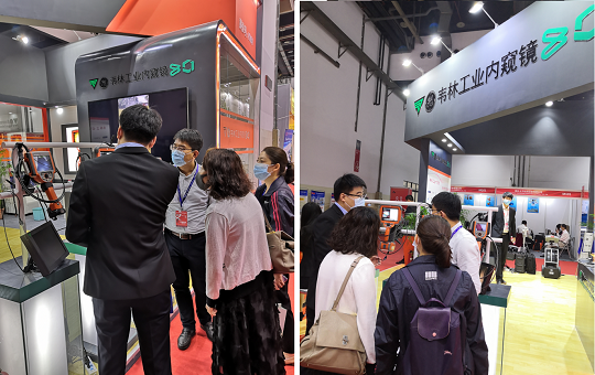 北京韋林意威特工業(yè)內窺鏡有限公司人員向參觀者介紹 北京韋林意威特工業(yè)內窺鏡有限公司人員向參觀者介紹